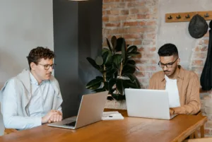 PyraNext software engineers collaborating on custom website and mobile app development